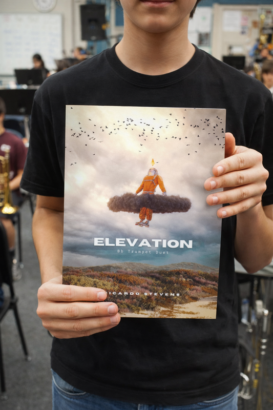 Person holding a book titled 'Elevation' in an indoor setting by Ricardo Stevedores ns.