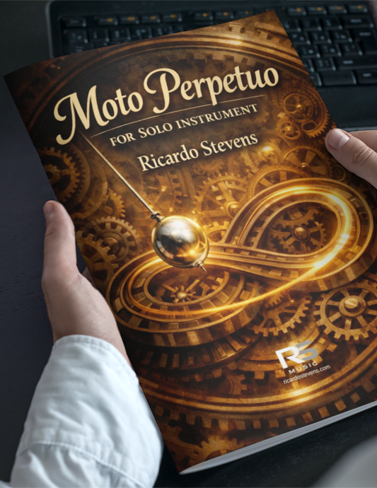 Book titled 'Moto Perpetuo' by Ricardo Stevens held by a person with a keyboard in the background.